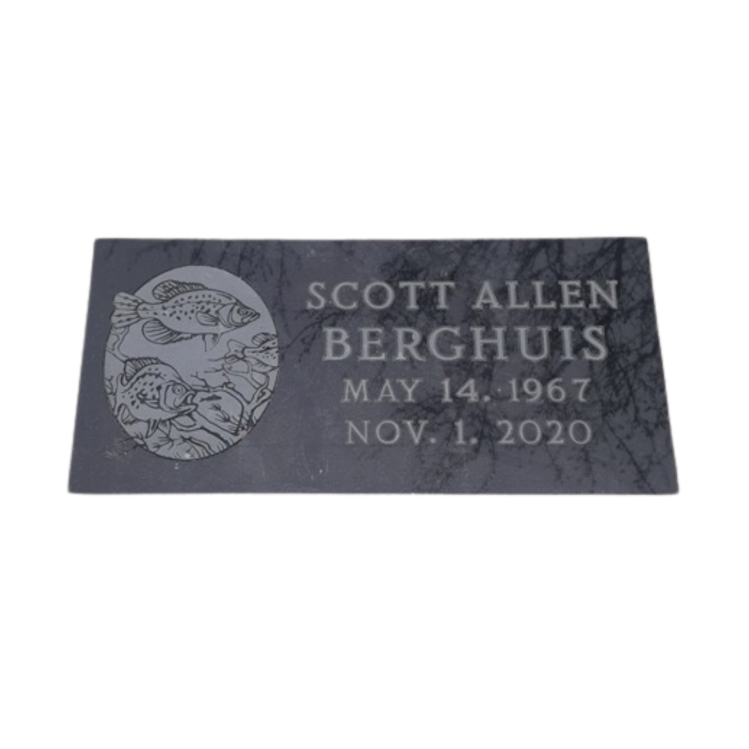Flat dark granite marker featuring fish.