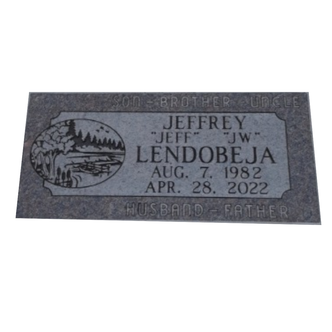 Flat, dark grey granite marker with engraved nature scene.