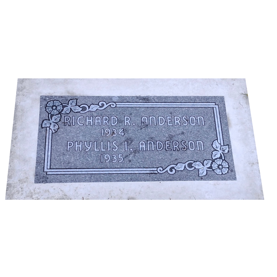 Flat granite companion marker with flower accents.