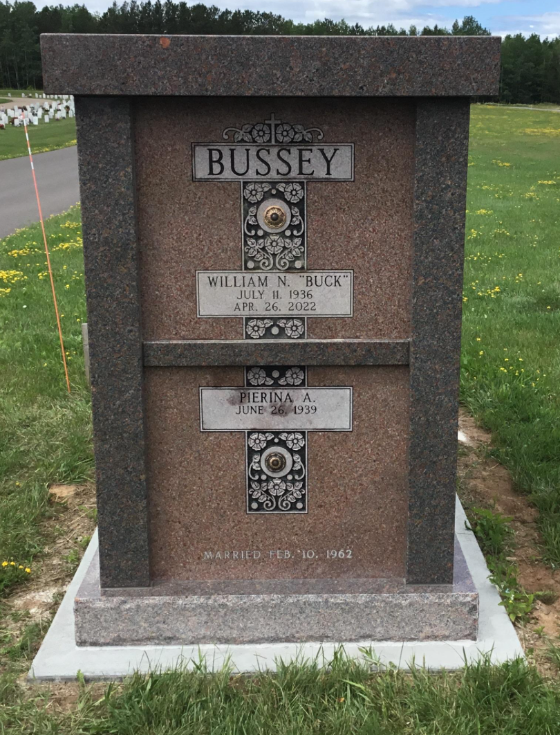Granite cremation memorial designed to securely hold the cremated remains of the Bussey family.