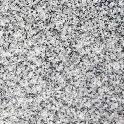 Granite with large black and white specks.