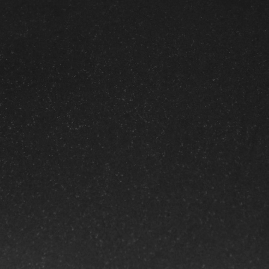 Black granite with small specks of gold.