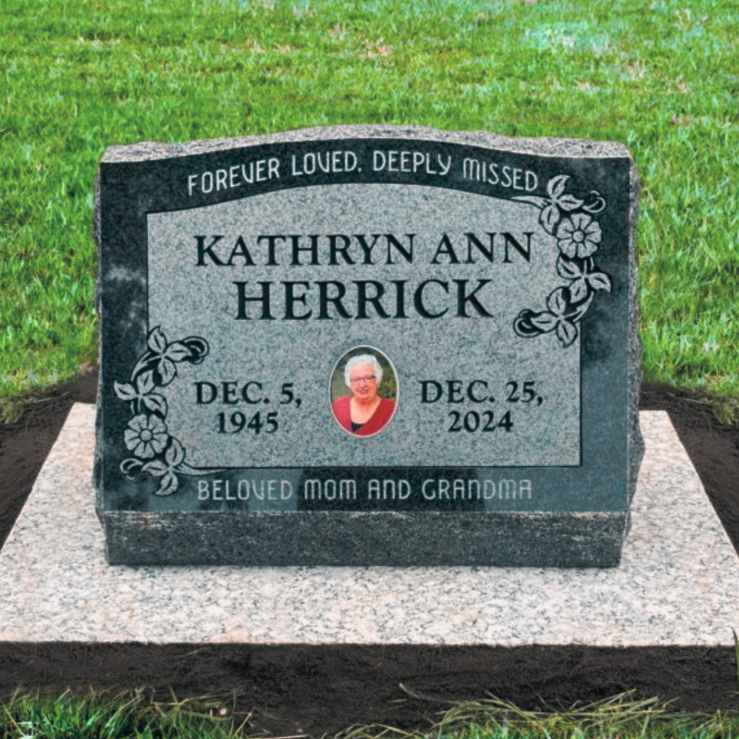 Slant marker in grey granite with ceramic photo.