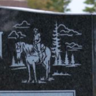 Nature scene on a cemetery monument.