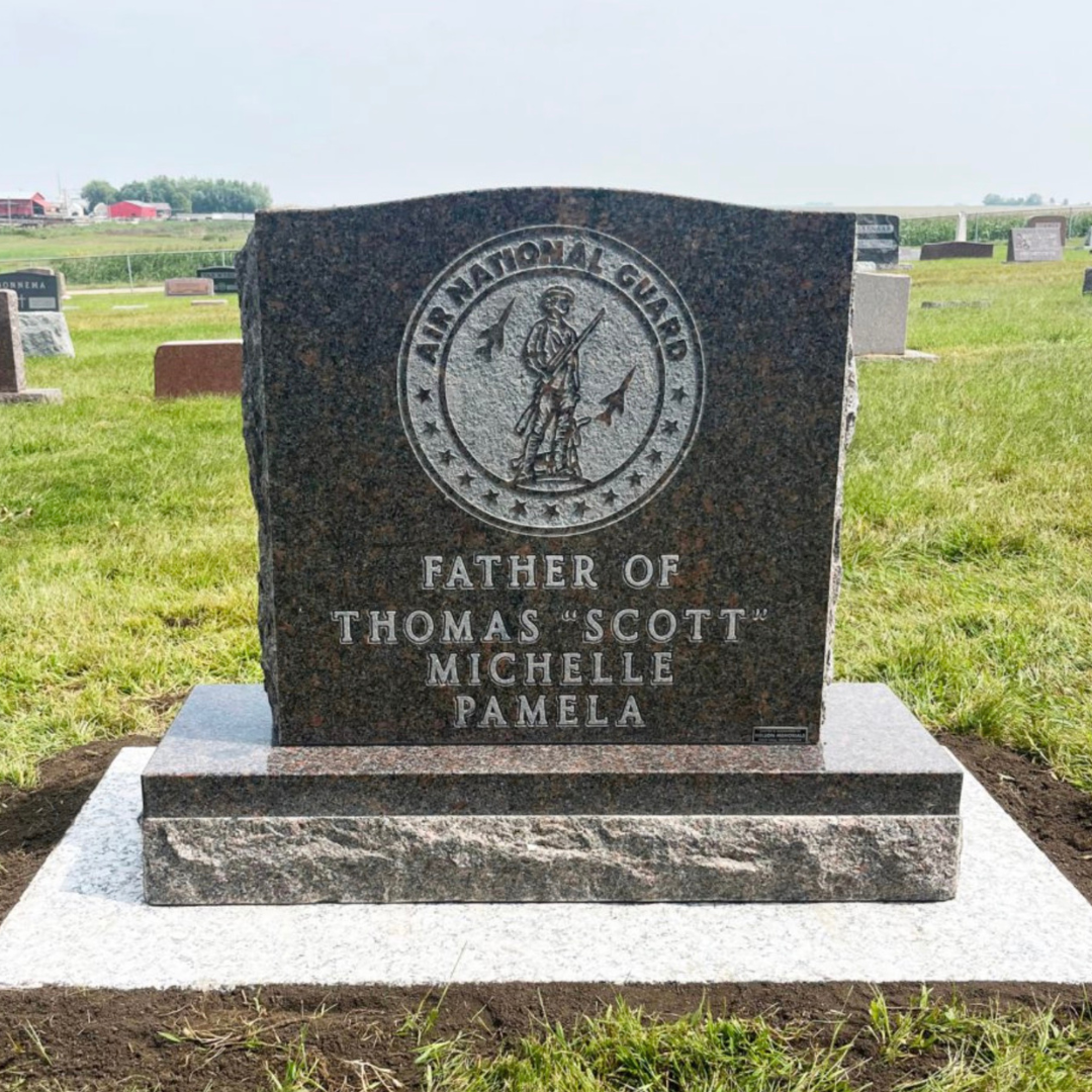 Upright granite personal military monument featuring the Air National Guard symbol.
