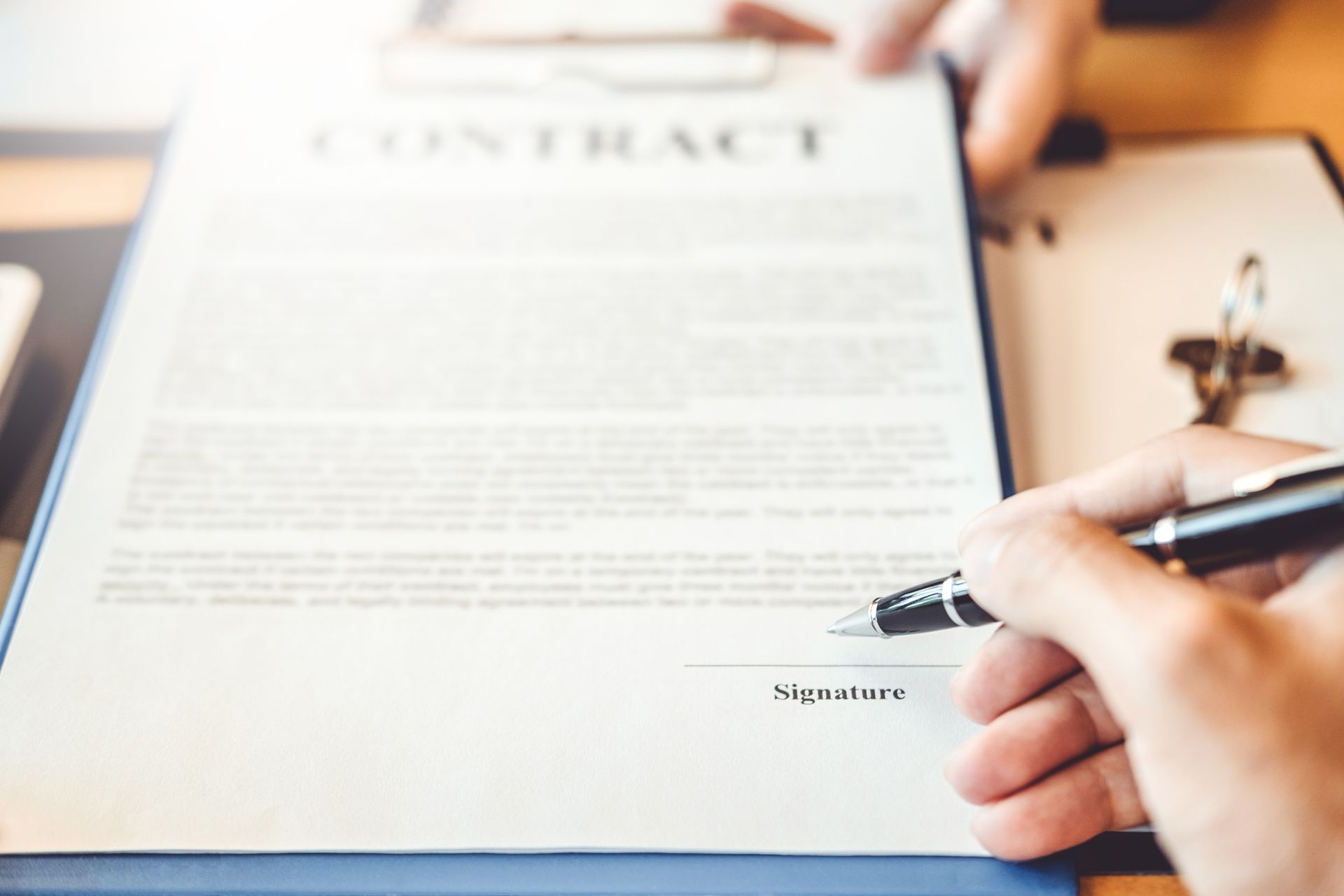 Signing a contract.