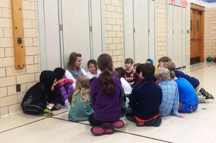 Teacher and a group of children — Ames, IA — Ames Community Preschool Center (ACPC)