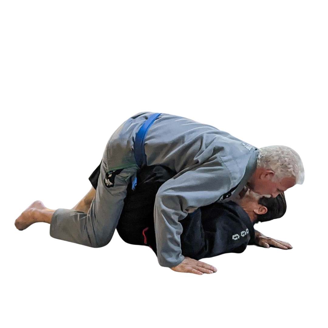 two men are fighting each other in a jiu jitsu match