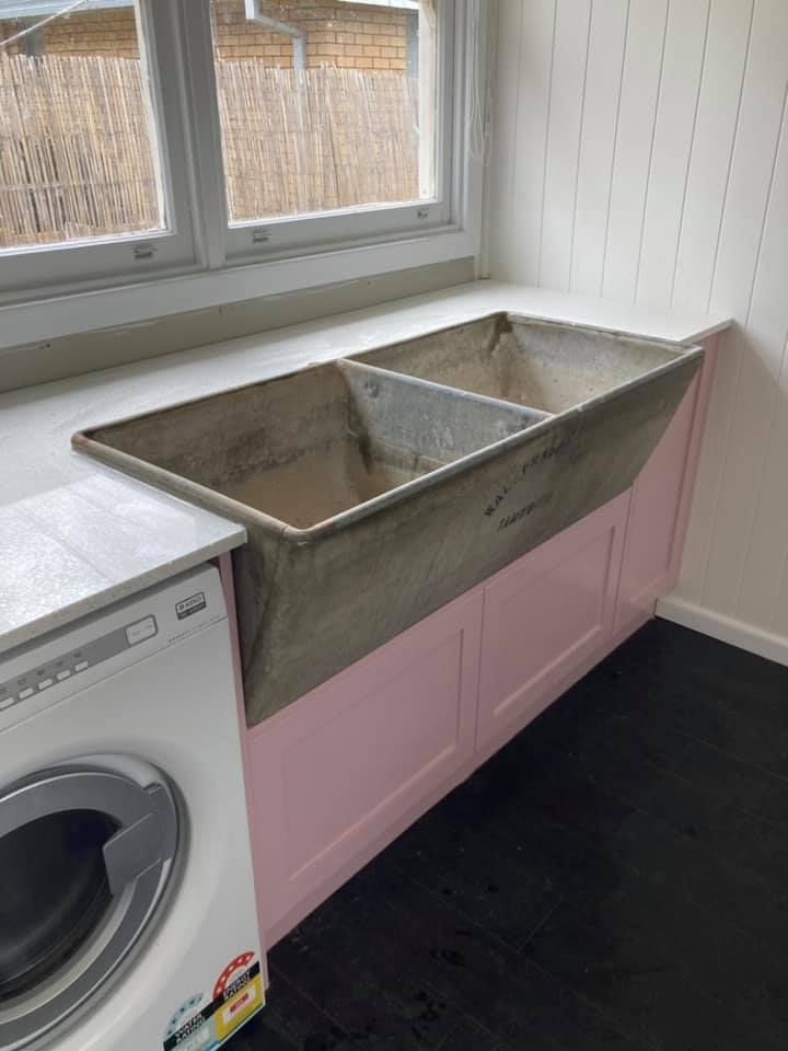 A Laundry Room With a Washing Machine and a Sink — Moore Than Just Kitchens In Gunnedah, NSW