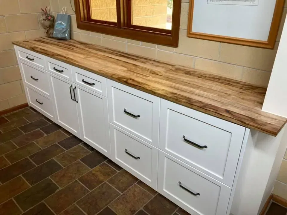 A Kitchen With White Cabinets and Wooden Counter Tops — Moore Than Just Kitchens In Manilla, NSW