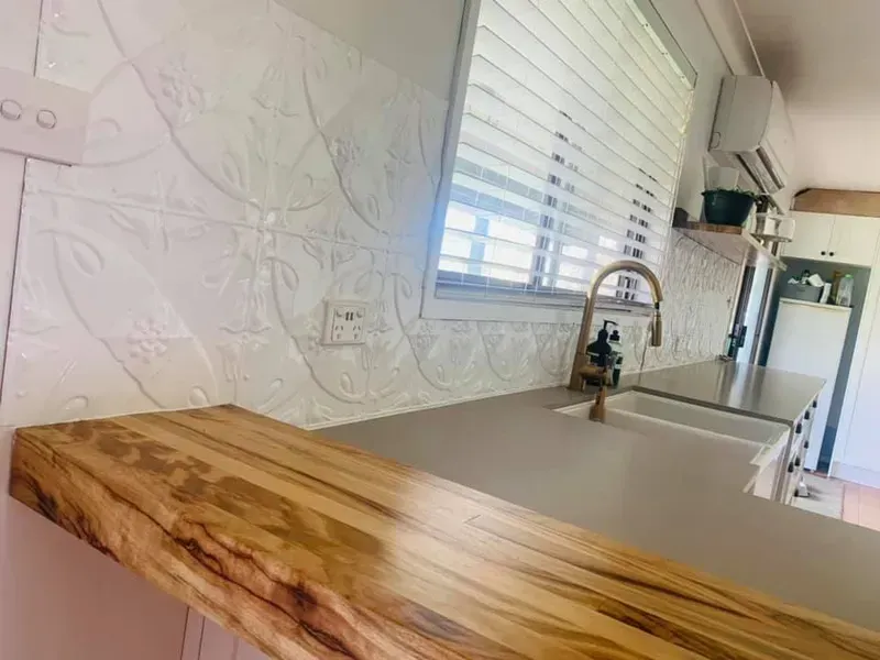 A Kitchen With a Wooden Counter Top and a Sink — Moore Than Just Kitchens In Manilla, NSW