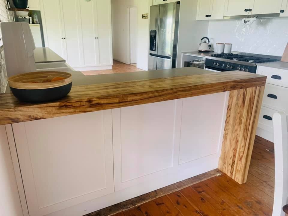 A Kitchen With White Cabinets and a Wooden Counter Top — Moore Than Just Kitchens In Gunnedah, NSW
