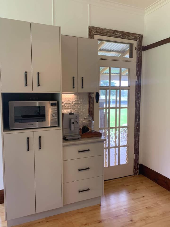 A Kitchen With a Microwave and a Coffee Maker — Moore Than Just Kitchens In Gunnedah, NSW