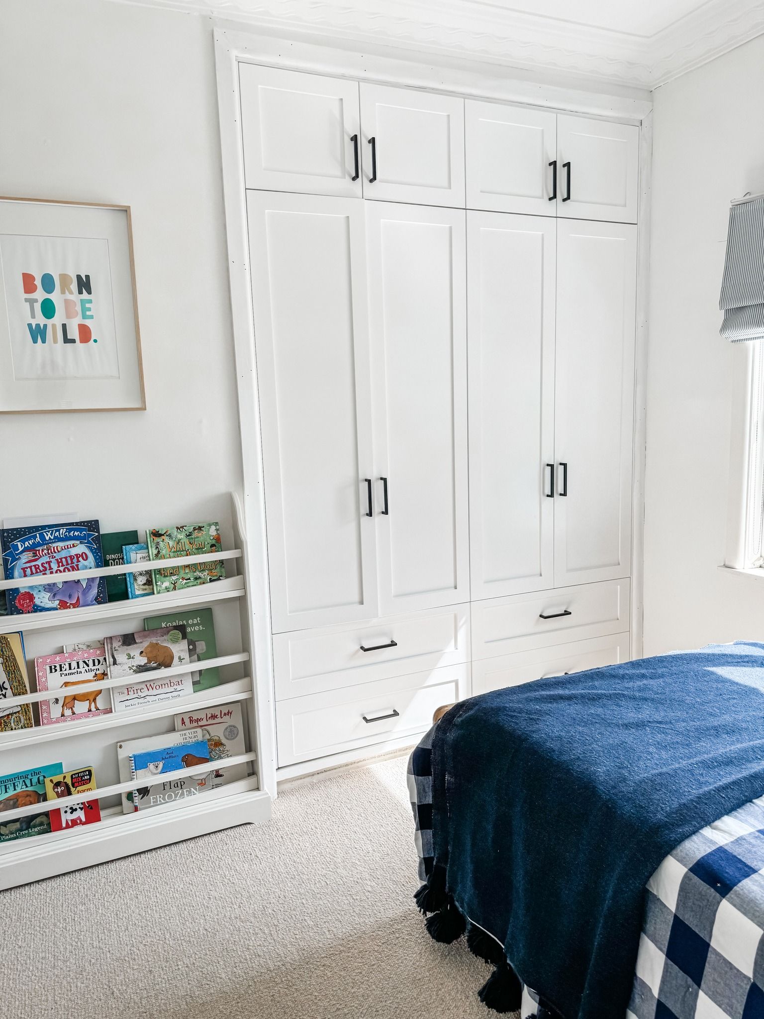 A Bedroom With a Bed, Bookshelf, and Closet — Moore Than Just Kitchens In Tamworth, NSW