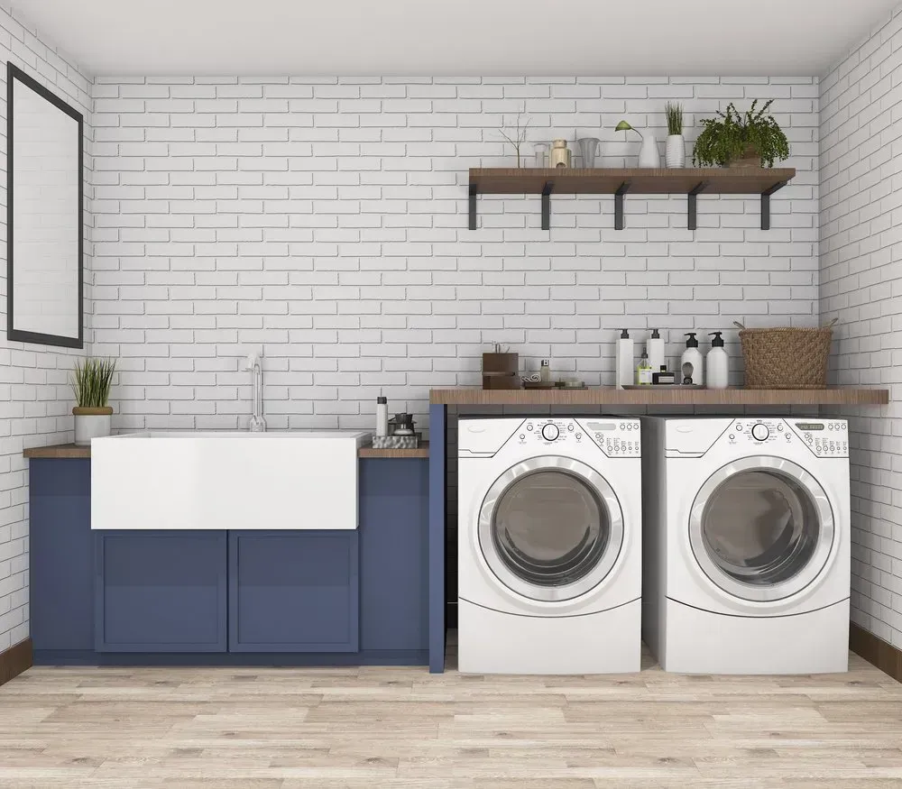 A Laundry Room With Two Washing Machines and a Sink — Moore Than Just Kitchens In Tamworth, NSW