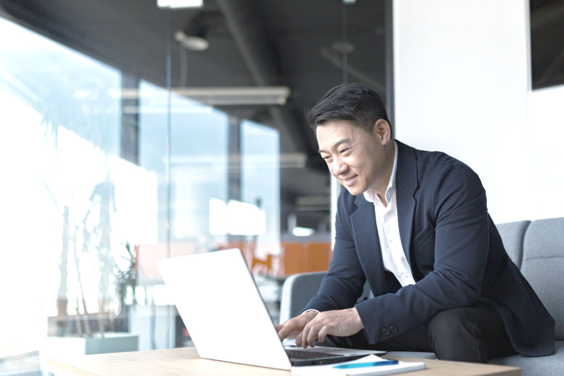 small business owner at computer register
