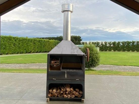 A fire place with a chimney on top of it