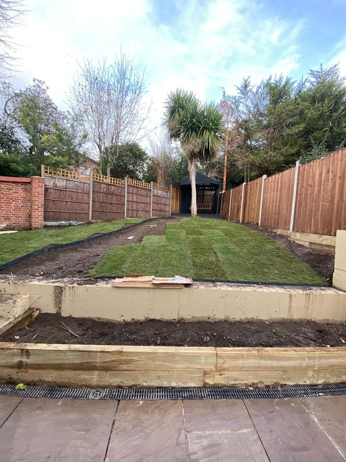 Residential garden before external landscaping and driveway works