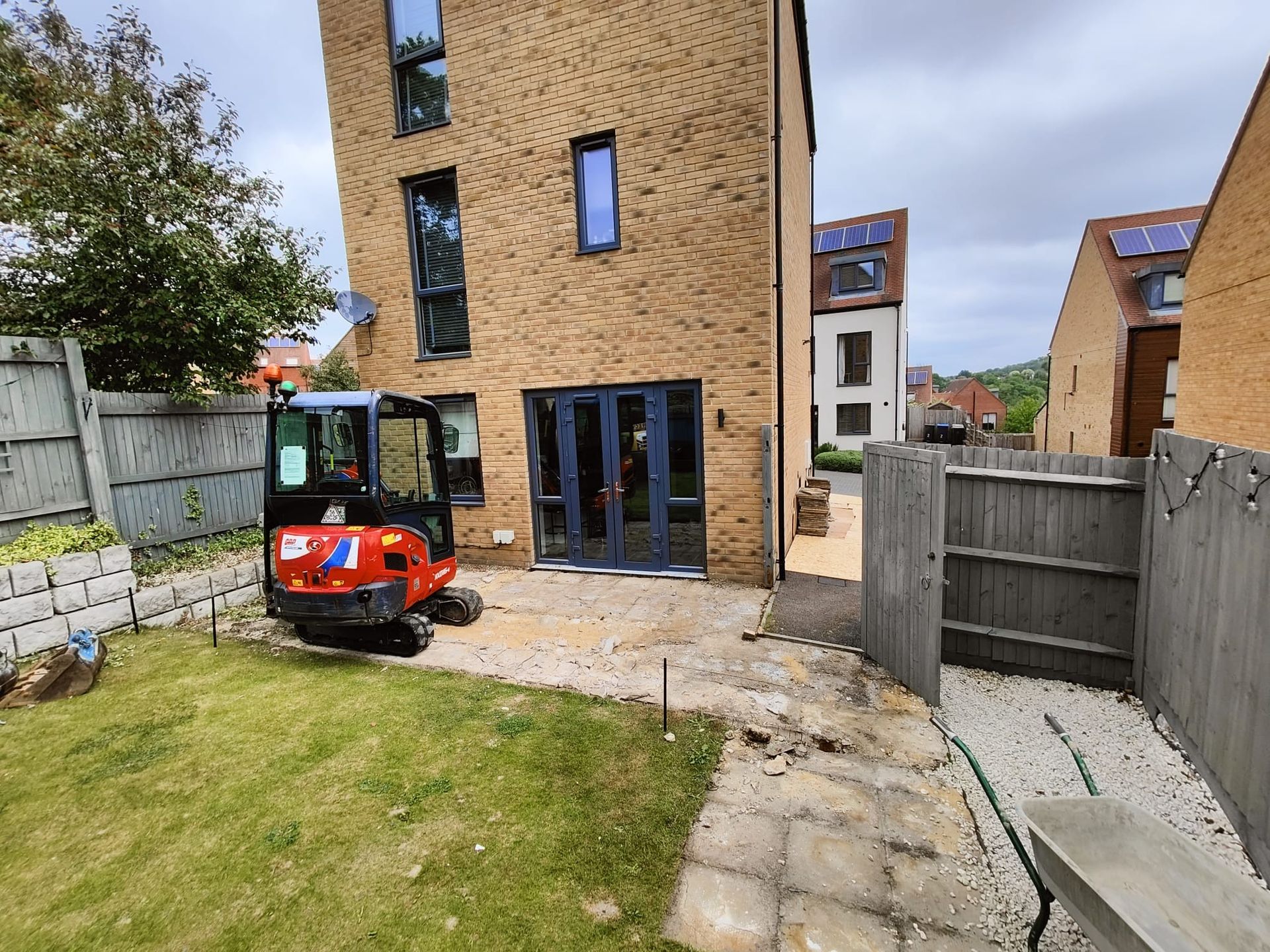 Completed rear house extension with artificial lawn and landscaping in South London