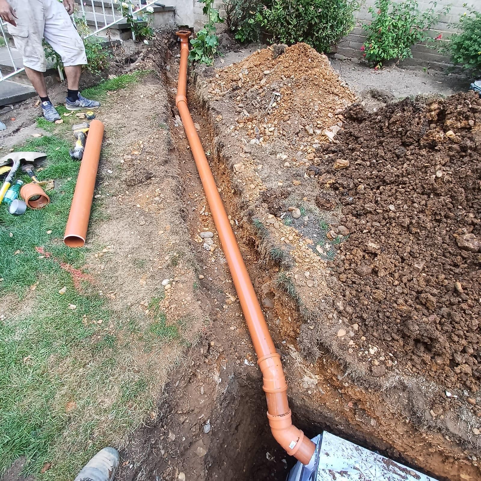 Drainage pipe installation for car park soakaway, Bushy