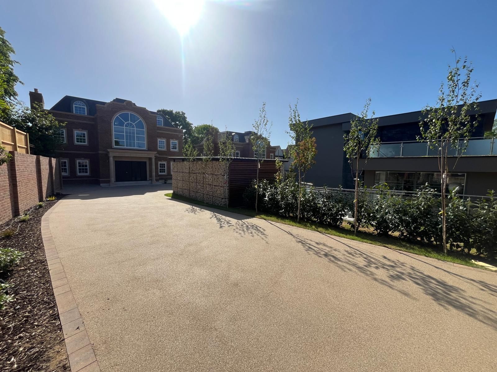 Completed resin-bound driveway and gabion wall at Sylvanias Cottages, New Malden