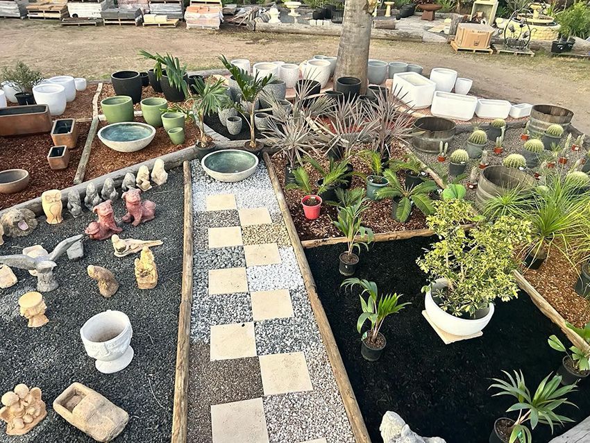 A Garden Filled With Lots of Potted Plants — Howard Landscape and Produce Supplies in Howard, QLD