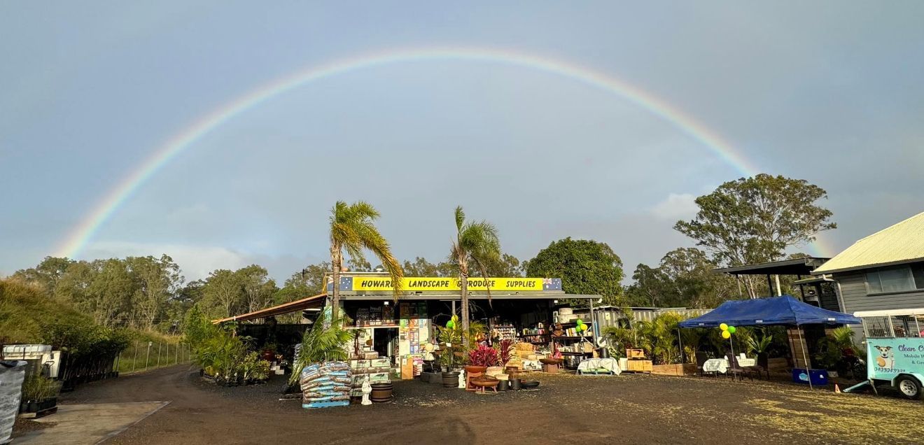 There is a Rainbow in the Sky Over a Shop — Howard Landscape and Produce Supplies in Howard, QLD