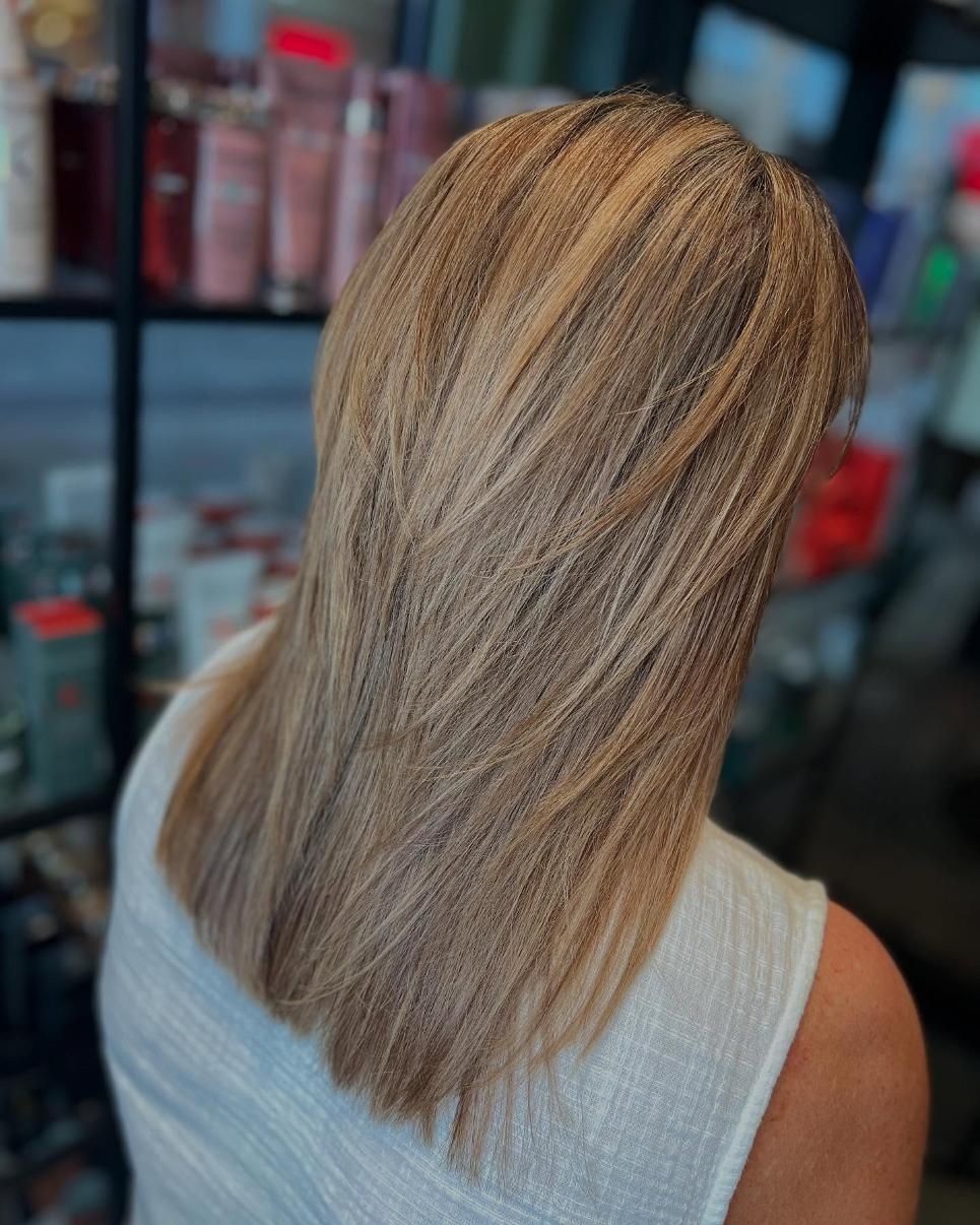 Woman With Layered Blonde Hair, Facing Away From Camera — Studio 23 In Biggera Waters, QLD