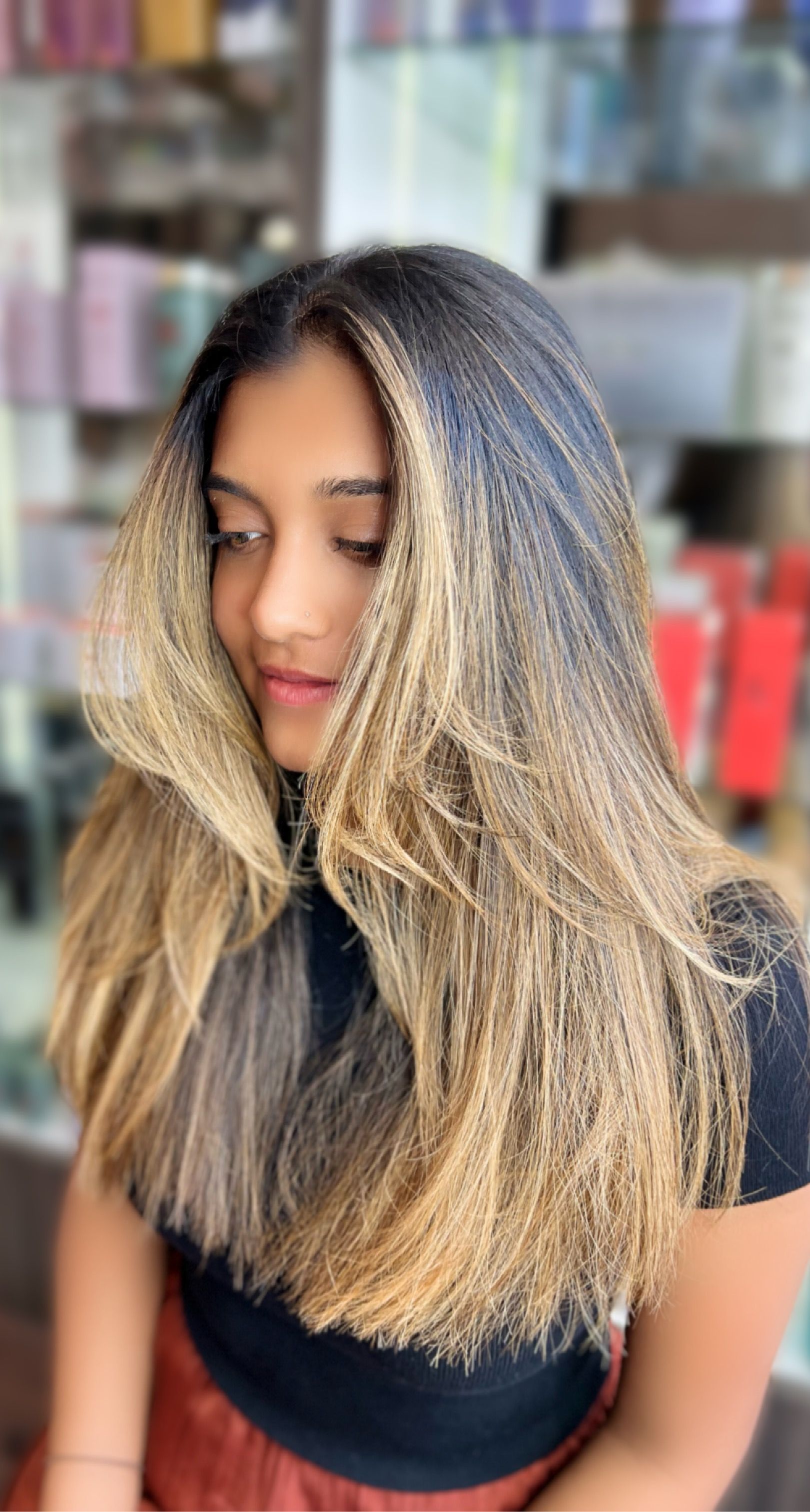Woman's Long, Wavy Blonde Hair Styled in a Salon — Studio 23 In Biggera Waters, QLD