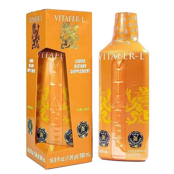 Botella de suplemento dietético líquido Vitafer-L de color naranja y caja a juego sobre un fondo blanco.