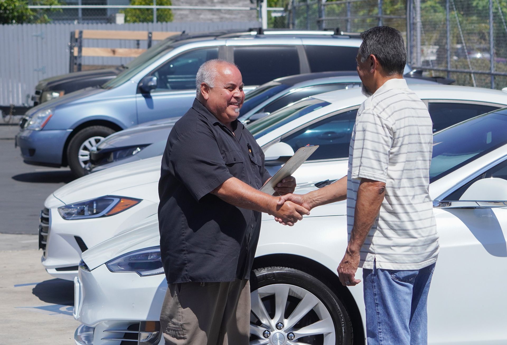 Rudy Carmona greeting a customer.