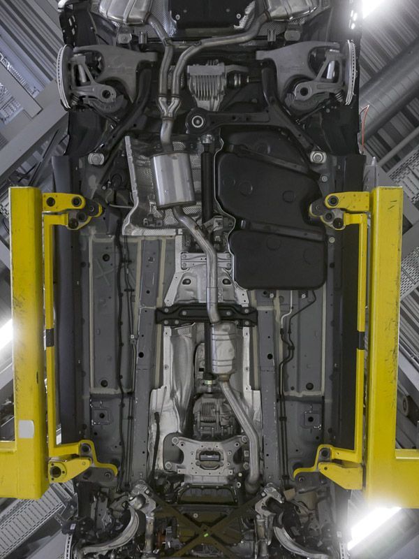 Repaired and cleaned chassis damage seen from below.