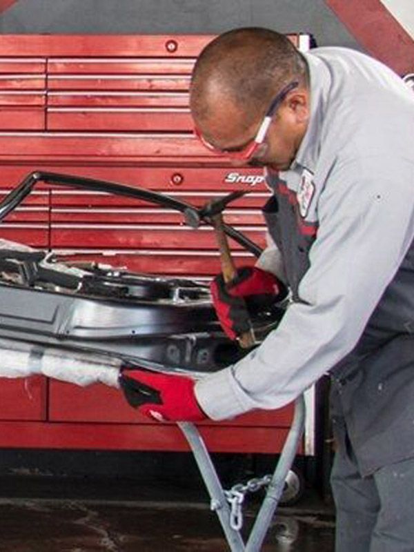 Repairing a car door.
