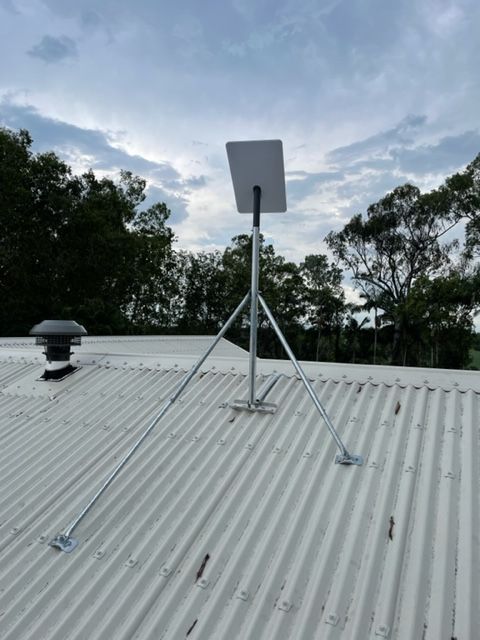 Satellite Dish on a Metal Tripod Mounted on a Roof — Apex Antenna Solutions Pty Ltd in Proserpine, QLD
