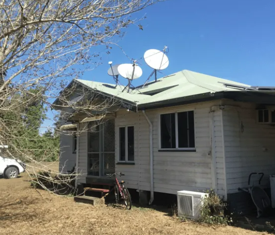 White House With Three Satellite Dishes on the Roof — Apex Antenna Solutions Pty Ltd in Whitsundays, QLD