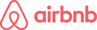 The airbnb logo is red and white on a white background.