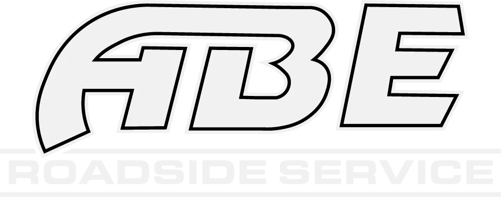 A black and white logo for abe roadside service