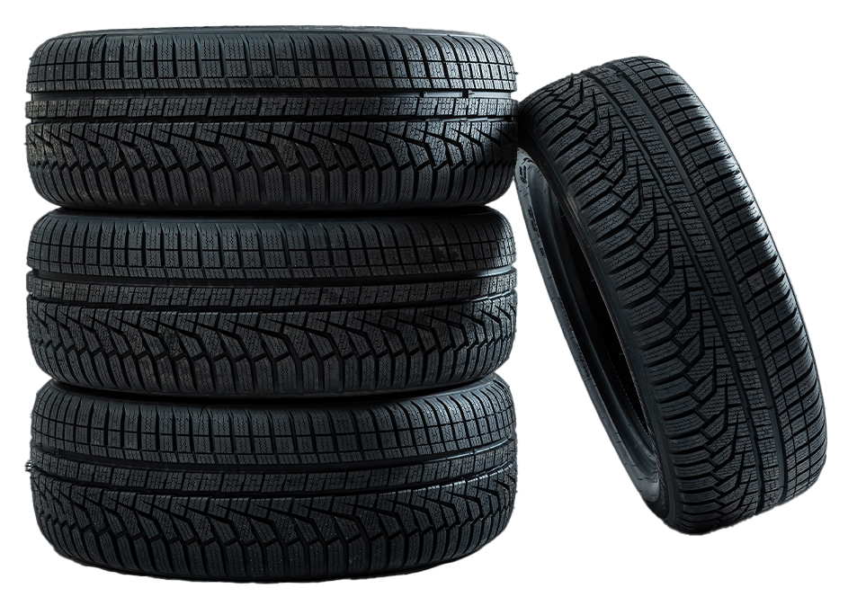 Four tires are stacked on top of each other on a white background.