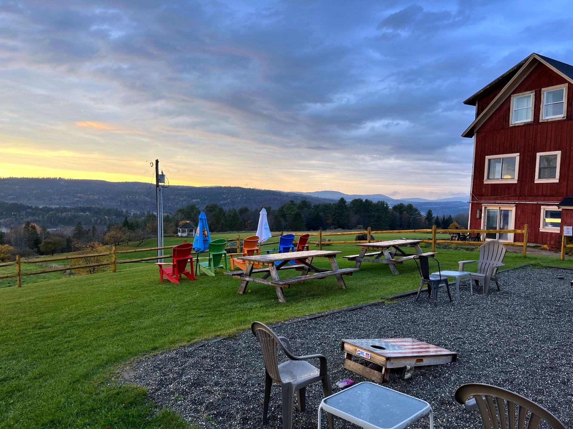 Early fall sunset over the red barn and valley at the Wildflower Inn, Lyndonville, Vermont