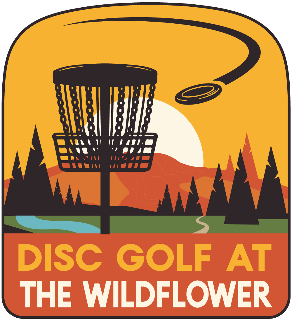 Disc golf basket at sunset with flying disc and text “Disc Golf at The Wildflower”