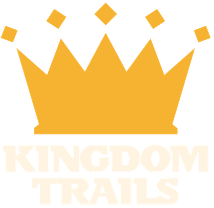 Golden crown logo above the words “Kingdom Trails” on a white background
