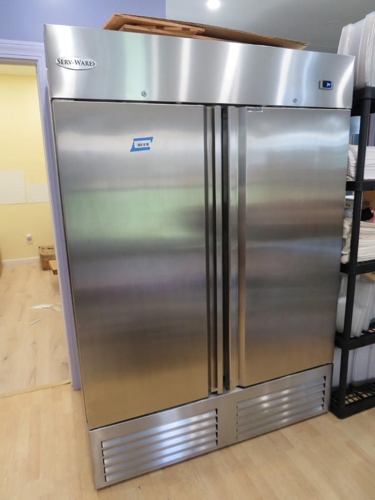 Stainless steel commercial refrigerator with dual doors.