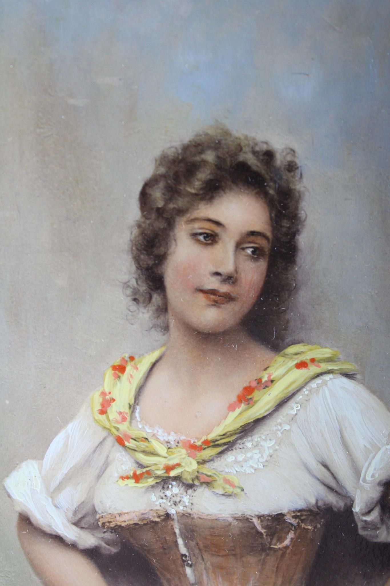 Woman with curly hair, wearing a white shirt and yellow scarf, looking to the side.
