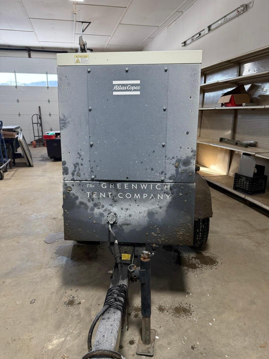 A gray generator on a trailer.
