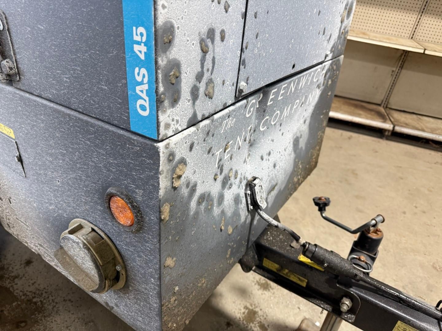 Close-up of a blue and gray machine with