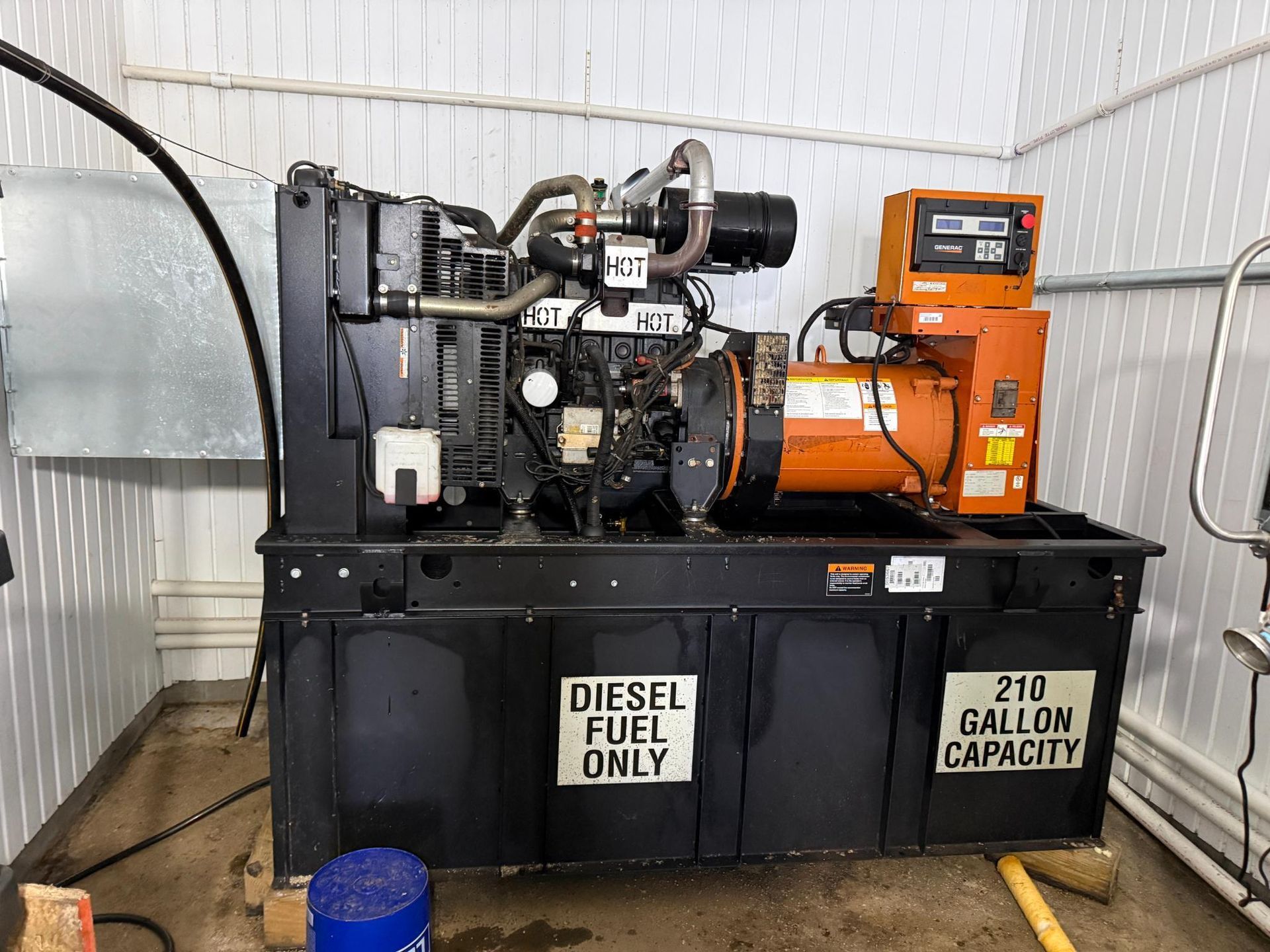 Diesel generator in an enclosure, marked 