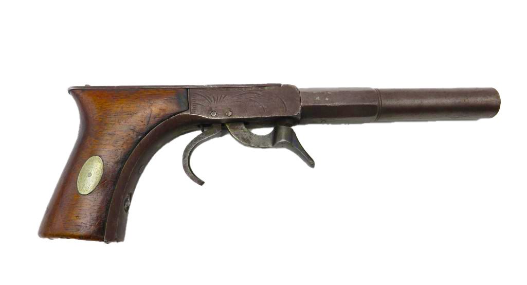 Antique pistol with wooden handle and metal barrel.
