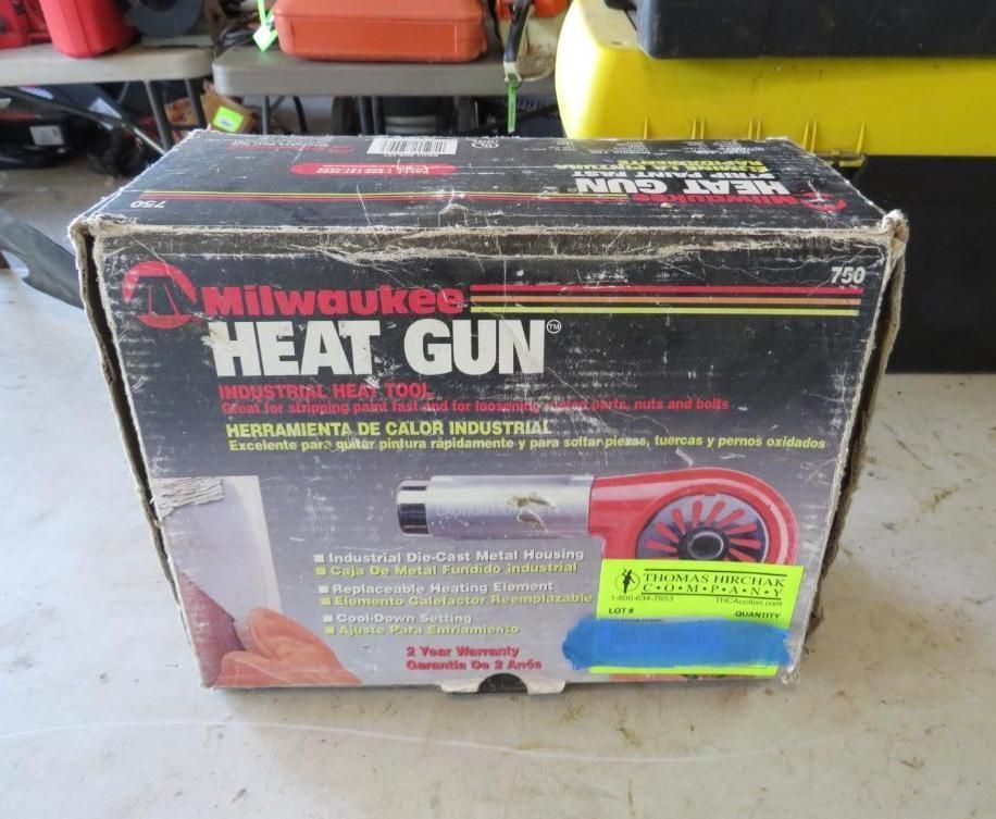 Milwaukee heat gun box. Black, red, and white. Industrial tool for paint, pipes, and more.