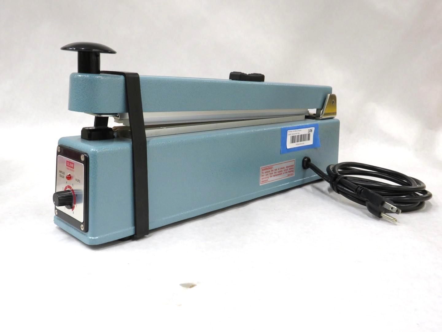 Blue impulse heat sealer machine with a black power cord.