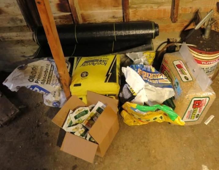 Bags and cardboard box with various items.